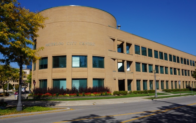 Waterloo City Centre municipal building under a deep blue sky